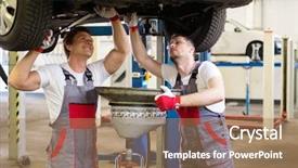  Presentation with mechanics - PPT theme enhanced with two mechanics changing oil background and a coral colored foreground