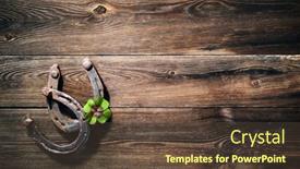  Presentation with four leaf clover - Theme with two-old-rusty-horse-shoes background and a tawny brown colored foreground