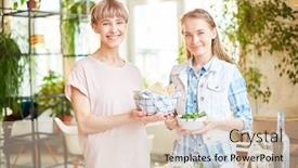  Presentation with everything - Audience pleasing PPT layouts consisting of two pretty girls with healthy food standing by served table while preparing everything for dinner backdrop and a soft green colored foreground