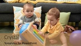  Presentation with toddlers - Slide deck consisting of two-toddlers-playing-with-balls background and a coral colored foreground