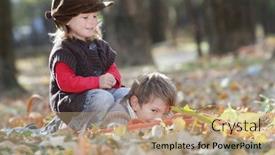  Presentation with young children playing - Cool new presentation theme with two young happy children - boy and girl - playing on natural autumn background backdrop and a coral colored foreground