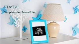  Presentation with baby ultrasound - PPT theme with unborn child - lamp and photo frame background and a lemonade colored foreground