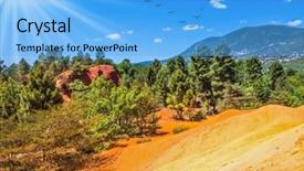  Presentation with color orange - Cool new PPT theme with unique red and orange hills in the province of languedoc - roussillon france the sun strengthens the color of ocher the concept of ecological tourism backdrop and a light blue colored foreground