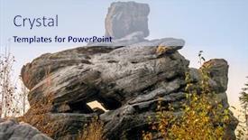  Presentation with rock - Colorful presentation theme enhanced with unique-sandy-rock-formation-within backdrop and a sky blue colored foreground