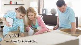  Presentation with cardboard - Amazing PPT theme having unpack - family unpacking cardboard boxes backdrop and a soft green colored foreground