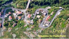  Presentation with mountains - Slide deck featuring up-view-of-little-city background and a tawny brown colored foreground