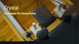  Presentation with gym - Amazing PPT theme having upholster - close-up of reformer on wooden backdrop and a tawny brown colored foreground