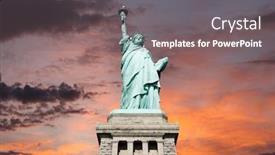 Presentation with liberty - Colorful PPT theme enhanced with upshot of the statue of liberty with sunset sky backdrop and a gray colored foreground