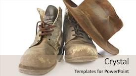  Presentation with 1940 - Slide set having battered old work boots and felt hat isolated on white used continuously since the 1940's background and a coral colored foreground