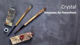  Presentation with paint art - Audience pleasing slide deck consisting of used-paintbrush-and-tubes backdrop and a gray colored foreground