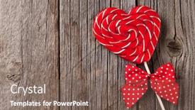  Presentation with candy heart - Cool new theme with valentines day candy heart on wooden table view with copy space backdrop and a gray colored foreground