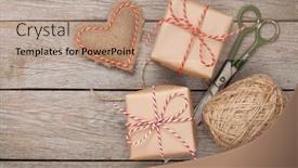  Presentation with valentines - PPT theme having valentines day gift wrapping with boxes and scissors over white wooden table background and a coral colored foreground