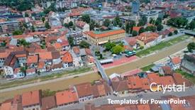  Presentation with drone - Slide deck having valjevo-aerial-drone-view background and a coral colored foreground