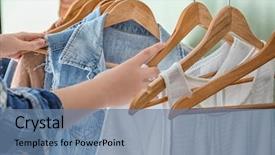  Presentation with clothes - Audience pleasing PPT layouts consisting of variety show - woman choosing clothes on rack backdrop and a seafoam green colored foreground