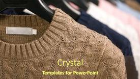  Presentation with cable - PPT layouts having various cable knit sweaters or pullovers on hanger rack in a clothes store or at a wardrobe selective focus background and a tawny brown colored foreground