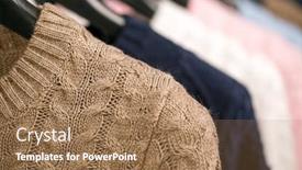  Presentation with cable - Cool new PPT layouts with various cable knit sweaters or pullovers on hanger rack in a clothes store or at a wardrobe selective focus backdrop and a coral colored foreground