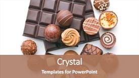  Presentation with bar pieces dark chocolate - Colorful presentation enhanced with various chocolate pralines and chocolate backdrop and a coral colored foreground