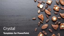  Presentation with cocoa beans - Slide set having various chocolate pralines and cocoa beans on black table top view background and a dark gray colored foreground
