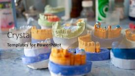  Presentation with molds - Audience pleasing slides consisting of various dental molds impressions backdrop and a coral colored foreground