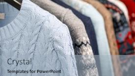  Presentation with knitted clothes - Beautiful slide deck featuring various knitted sweaters and pullovers on hanger rack in a clothes store or at a wardrobe selective focus backdrop and a light blue colored foreground
