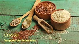  Presentation with seeds - Theme consisting of various seeds on green wooden background closeup background and a tawny brown colored foreground