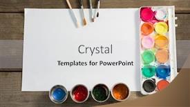  Presentation with watercolor - PPT theme having various watercolor paints paper and paint brushes on wooden surface background and a light gray colored foreground