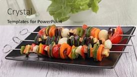  Presentation with kebab - Beautiful PPT theme featuring vegetables kebab backdrop and a gold colored foreground