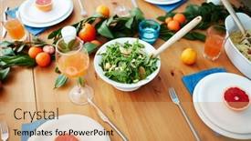  Presentation with vegetarian - Beautiful presentation theme featuring vegetarian salad juice in glasses fruit decorations and grapefruit halves on plates served for guests backdrop and a coral colored foreground
