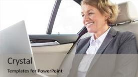  Presentation with instrument of car - Presentation theme having vehicle safety communications - smiling businesswoman using laptop background and a light gray colored foreground