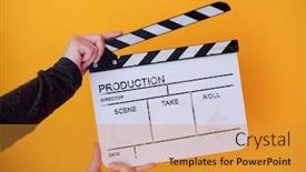  Presentation with action movie - Colorful PPT theme enhanced with video-production-movie-clapper-cinema backdrop and a gold colored foreground