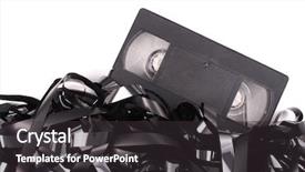  Presentation with large orchestra tape recorder - PPT layouts featuring video tapte - photo of bye tape background and a dark gray colored foreground