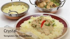  Presentation with curry leaves - PPT theme enhanced with view of balti chicken pasanda curry served on a bed of saffron rice garnished with coriander leaves and a red chilli background and a coral colored foreground