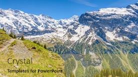  Presentation with snow mountain - Beautiful theme featuring view of beautiful landscape in the alps with fresh green meadows and snow-capped mountain tops in the background on a sunny day with blue sky and clouds in springtime backdrop and a yellow colored foreground