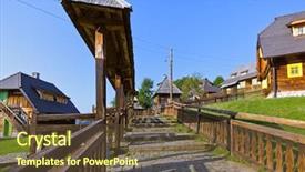  Presentation with iranian traditional architecture - Slides with village drvengrad mecavnik in serbia background and a tawny brown colored foreground
