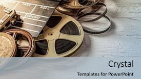  Presentation with film - Cool new presentation theme with vintage - film camera chalkboard and roll backdrop and a light blue colored foreground