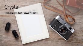 Presentation with camera film - Cool new theme with vintage film camera and blank backdrop and a mint green colored foreground