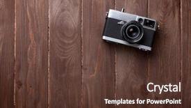  Presentation with camera film - Beautiful PPT theme featuring vintage film camera on wooden backdrop and a tawny brown colored foreground