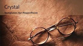  Presentation with vintage paper - Beautiful PPT theme featuring vintage glasses on the very backdrop and a coral colored foreground