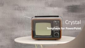  Presentation with vintage - Beautiful presentation theme featuring vintage-tv-set-on-table backdrop and a gray colored foreground