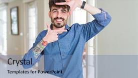  Presentation with creativity - Theme having young man wearing casual shirt sitting on white table smiling making frame with hands and fingers with happy face creativity and photography concept background and a teal colored foreground