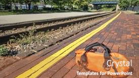  Presentation with waiting line - Amazing presentation theme having waiting for a train concept - a bright orange duffel on a station platform behind yellow line backdrop and a red colored foreground