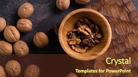  Presentation with walnut - Audience pleasing PPT theme consisting of walnut kernels in wooden bowl backdrop and a tawny brown colored foreground