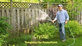  Presentation with soil shovel in the garden - Beautiful PPT theme featuring water plant - man watering the garden backdrop and a tawny brown colored foreground