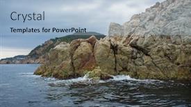  Presentation with seashore - Cool new presentation theme with wave breaking rocky seashore backdrop and a light blue colored foreground