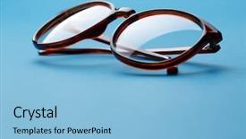  Presentation with brown - Amazing theme having wear logo - folded brown spectacles close up backdrop and a light blue colored foreground