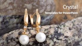 Presentation with diamonds - Presentation theme enhanced with pair of beautiful gold earrings with diamonds and pearls on the natural stones background background and a coral colored foreground
