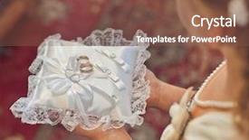  Presentation with wedding rings - Amazing PPT theme having wedding rings on the pillow backdrop and a tawny brown colored foreground