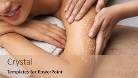  Presentation with wellness - Colorful theme enhanced with wellness beauty and relaxation concept - close up of woman having salt massage at spa backdrop and a coral colored foreground