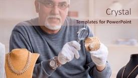  Presentation with workshop - Presentation featuring white-bearded-old-jeweler and a soft green colored foreground