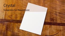  Presentation with aged paper - Slide set having white paper pad on antique or aged wooden table background and a gold colored foreground